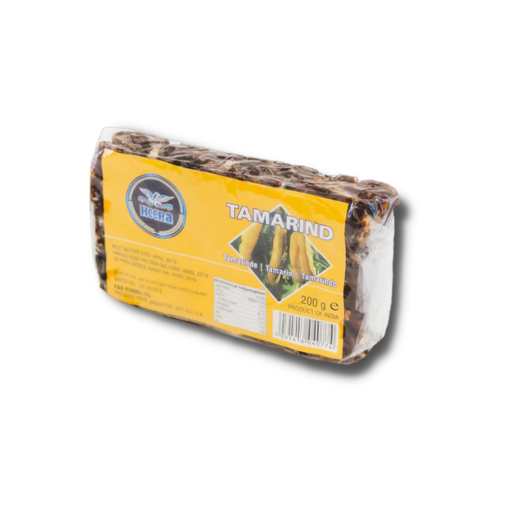 HEERA Imli (Indian Tamarind) 200G, dark brown tamarind pulp in a clear package.