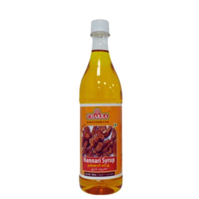 A bottle of Chakra Nannari Syrup 700ml, showcasing its rich, dark color.